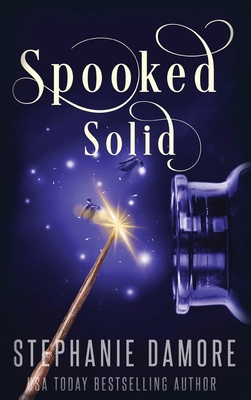 Spooked Solid: A Paranormal Cozy Mystery Cover Image