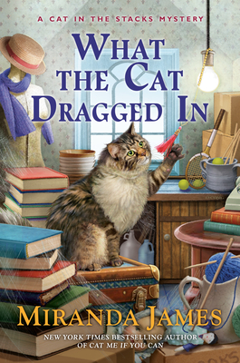What the Cat Dragged In (Cat in the Stacks Mystery #14) Cover Image