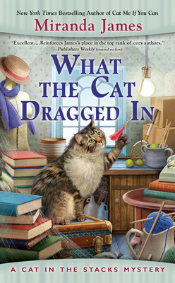 What the Cat Dragged In (Cat in the Stacks Mystery #14) Cover Image