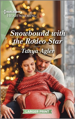 Snowbound with the Rodeo Star: A Clean and Uplifting Romance (Rodeo Stars of Violet Ridge #2)