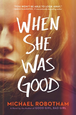 Book cover: When She Was Good by Michael Robotham.  Behind the white, handwritten title is a photo of a While woman with golden hair falling into her face. Parts of the photo glow red, as if the film was slightly corrupted.