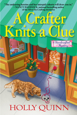 A Crafter Knits a Clue: A Handcrafted Mystery Cover Image