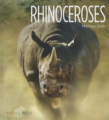 Rhinoceroses (Living Wild) Cover Image