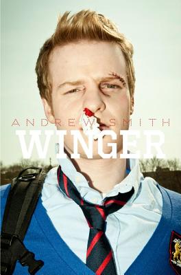 Book cover: Winger. Cover art features a photograph of a young man in a school uniform. He has light peach skin and reddish hair. Over his left eyebrow is a stitched scar, and his nose is plugged with a bloody tissue.