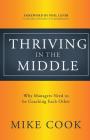 Thriving in the Middle: Why Managers Need to be Coaching Each Other By Mike Cook Cover Image