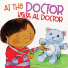 At the Doctor / Visita Al Doct (New Experiences) By Molly Fields Cover Image