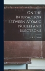 On the Interaction Between Atomic Nuclei and Electrons Cover Image