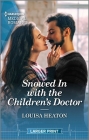 Snowed in with the Children's Doctor: Curl Up with This Magical Christmas Romance! By Louisa Heaton Cover Image