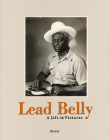 Lead Belly: A Life in Pictures By John Reynolds (Editor), Tiny Robinson (Editor), Jack Kerouac (Text by (Art/Photo Books)) Cover Image