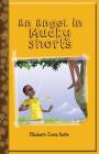 An Angel in Mucky Shorts By Elizabeth-Irene Baitie Cover Image