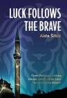 Luck Follows the Brave: From Refugee Camps, Abuse, and Suicide Loss to Living the Dream By Aida Šibić, Laura L. Bush (Editor) Cover Image