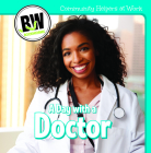 A Day with a Doctor (Community Helpers at Work) Cover Image