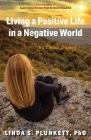 Living a Positive Life in a Negative World: My Uphill Journey By Linda S. Plunkett Cover Image