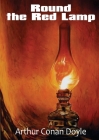 Round the Red Lamp: a volume collecting 15 short stories written by Arthur Conan Doyle. These are medical and fantasy stories. The idea ha By Arthur Conan Doyle Cover Image