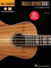 Hal Leonard Ukulele Method Deluxe Beginner Edition: Includes Book, Video and Audio All in One! By Lil' Rev Cover Image