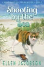 Shooting by the Sea By Ellen Jacobson Cover Image