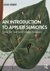 An Introduction to Applied Semiotics: Tools for Text and Image Analysis By Louis Hébert, Julie Tabler (Translator) Cover Image