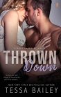 Thrown Down By Tessa Bailey Cover Image