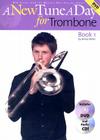 A New Tune a Day - Trombone, Book 1 [With CD and DVD] By Amos Miller Cover Image