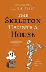 The Skeleton Haunts a House By Leigh Perry Cover Image