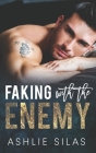 Faking With The Enemy: Enemies to Lovers Billionaire Romance Cover Image