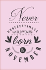 Never underestimate an old woman born in November: Funny gag pink notebook to write in with November birthday quote. Perfect birthday gift for woman w Cover Image