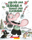 ¡Un día una señora se tragó una cuchara! (There Was an Old Lady Who Swallowed a Spoon!) By Lucille Colandro, Jared Lee (Illustrator) Cover Image