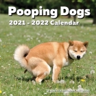 Pooping Dogs 2021-2022 - 18 Month Calendar: Funny Pooches Wall Planner Gag Gift Idea for Dog Lovers White Elephant Party, Santa Secret, Stocking Stuff Cover Image