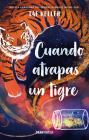 Cuando atrapas un tigre By Tae Keller Cover Image