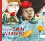 The Day Saida Arrived By Susana Gómez Redondo, Sonja Wimmer (Illustrator), Lawrence Schimel (Translator) Cover Image