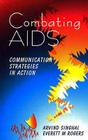 Combating AIDS: Communication Strategies in Action By Arvind M. Singhal, Everett M. Rogers Cover Image