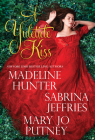A Yuletide Kiss By Madeline Hunter, Sabrina Jeffries, Mary Jo Putney Cover Image