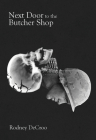Next Door to the Butcher Shop By Rodney DeCroo Cover Image