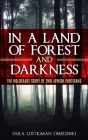 In a Land of Forest and Darkness: The Holocaust Story of two Jewish Partisans By Sara Lustigman Omelinski Cover Image