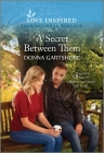 A Secret Between Them: An Uplifting Inspirational Romance Cover Image