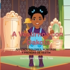 A Vestirnos con Dakota: Aprende Colores, Numeros y Prendas de Vestir By Dakota Glanville, Amina Yaqoob (Illustrator), Danicia Tate Cover Image