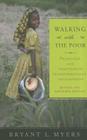 Walking with the Poor: Principles and Practices of Transformational Development (Revised, Expanded) By Bryant L. Myers Cover Image