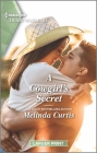 A Cowgirl's Secret: A Clean Romance By Melinda Curtis Cover Image