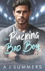 The Pucking Bad Boy: An Enemies to Lovers Secret Baby Hockey Romance Cover Image