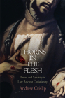 Thorns in the Flesh: Illness and Sanctity in Late Ancient Christianity (Divinations: Rereading Late Ancient Religion) By Andrew Crislip Cover Image