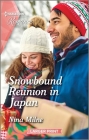 Snowbound Reunion in Japan: Curl Up with This Magical Christmas Romance! By Nina Milne Cover Image