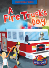 A Fire Truck's Day (Machines at Work) Cover Image