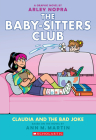 Claudia and the Bad Joke: A Graphic Novel (The Baby-sitters Club #15) (The Baby-Sitters Club Graphix) Cover Image