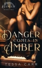 Danger Comes in Amber By Tessa Carr Cover Image