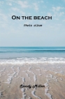 On the beach: Photo album By Sandy Miller Cover Image