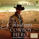 The Christmas Cowboy Hero Lib/E: A Western Romance Novel By Donna Grant, Rebecca Estrella (Read by) Cover Image