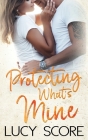 Protecting What's Mine: A Small Town Love Story By Lucy Score Cover Image