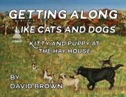 Getting Along Like Cats and Dogs: Kitty and Puppy at the Hay House By David Brown Cover Image