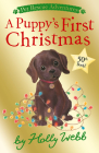 A Puppy's First Christmas (Pet Rescue Adventures) By Holly Webb, Sophy Williams (Illustrator) Cover Image
