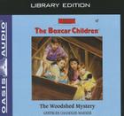 The Woodshed Mystery (Library Edition) (The Boxcar Children Mysteries #7) Cover Image